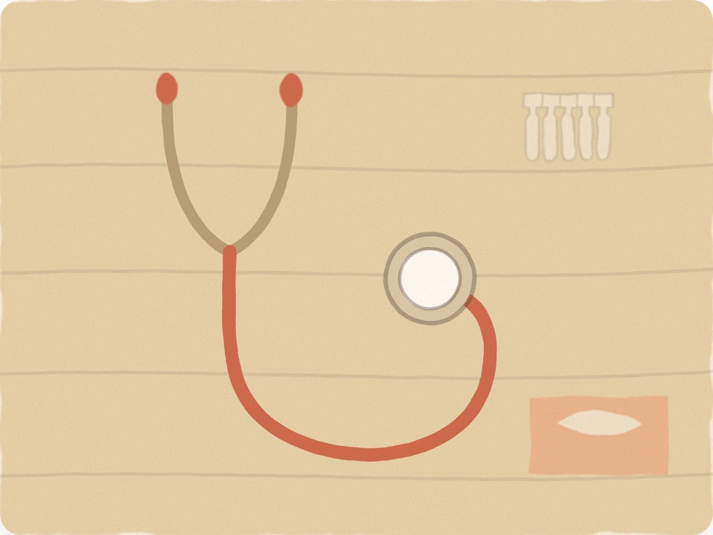 Un stéthoscope au premier plan et, en retrait, des dosettes et une boîte de mouchoirs